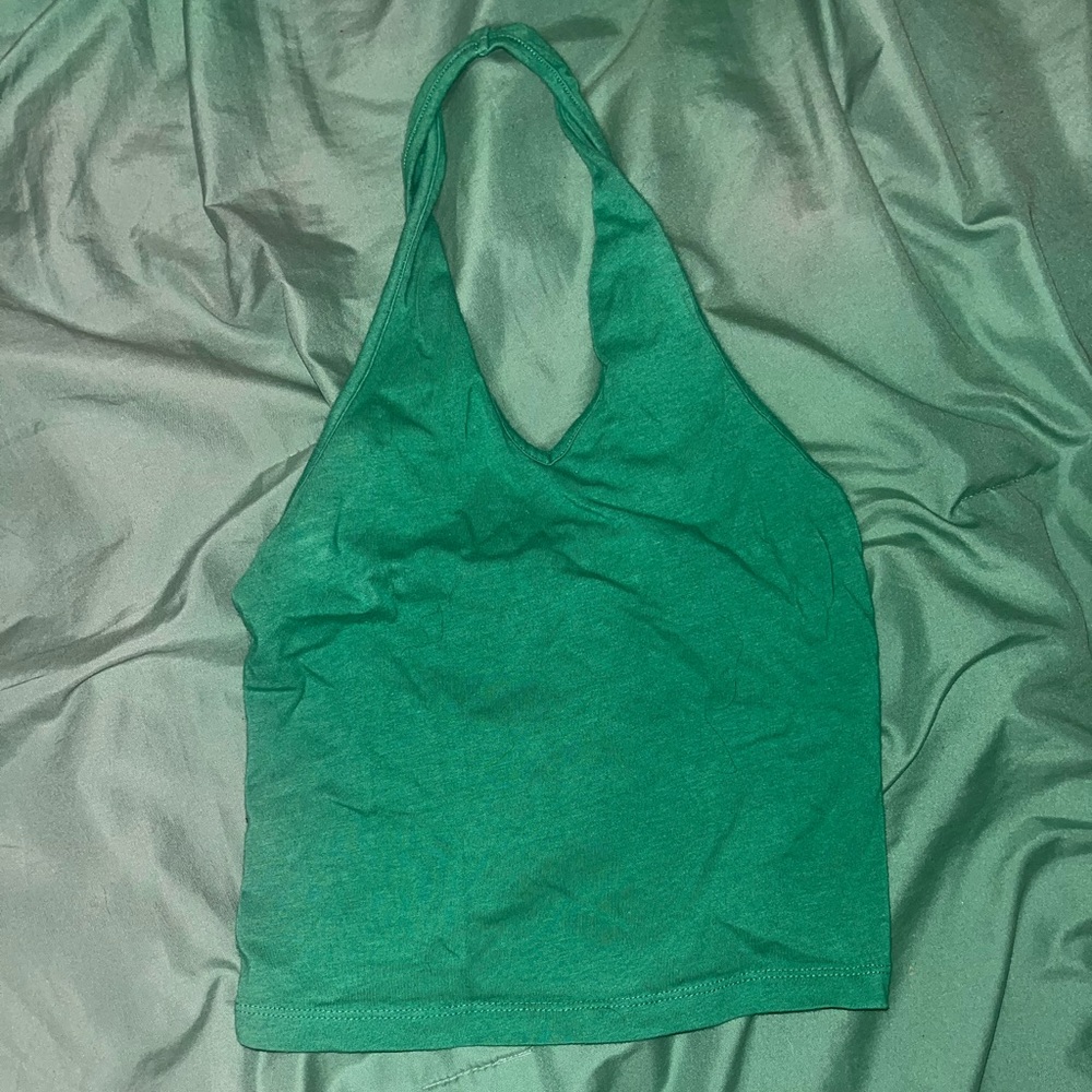 Cropped green halter top.
